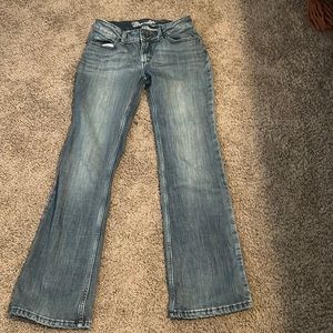 Wrangler size 1 (fit a size 2) in a medium wash.